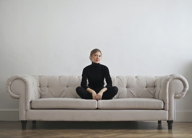 woman wearing a black turtleneck like a minimalist personal uniform