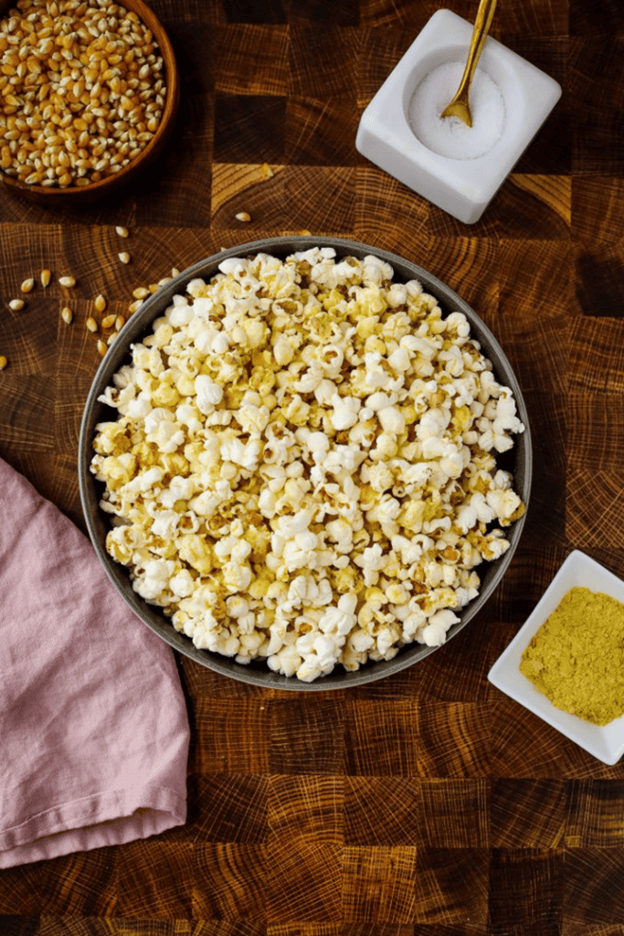 A bowl of Popcorn with nutritional yeast